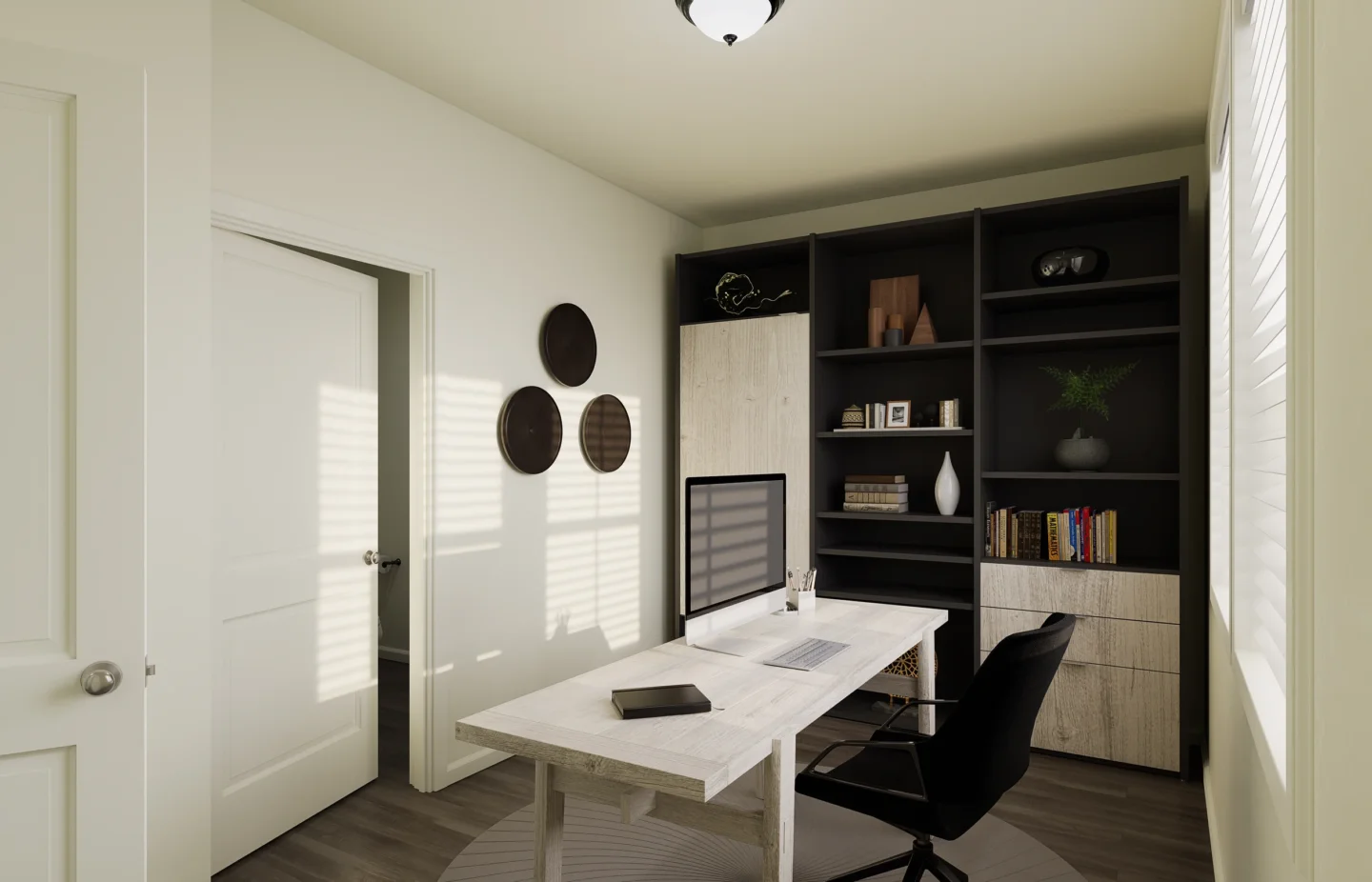 Home office with built-in shelving inside a townhome at The Peaks at Canyons in Castle Pines, CO
